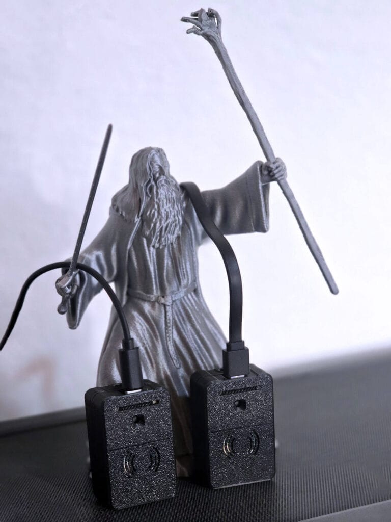Seeed Studio 60GHz mmWave Sensors MR60BHA2 & MR60FDA2 Review by SmartHomeScene: Gandalf Holding Sensors for Benchmark