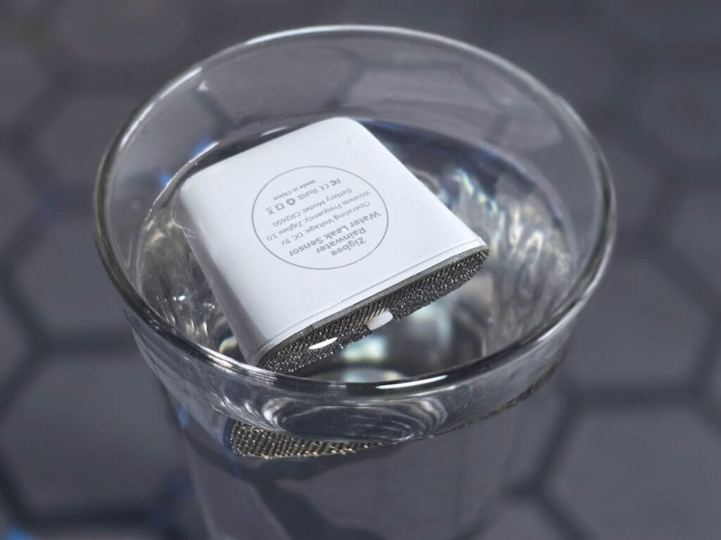 Tuya Rain Sensor SJ100 Review SmartHomeScene Submerged in Glass of Water