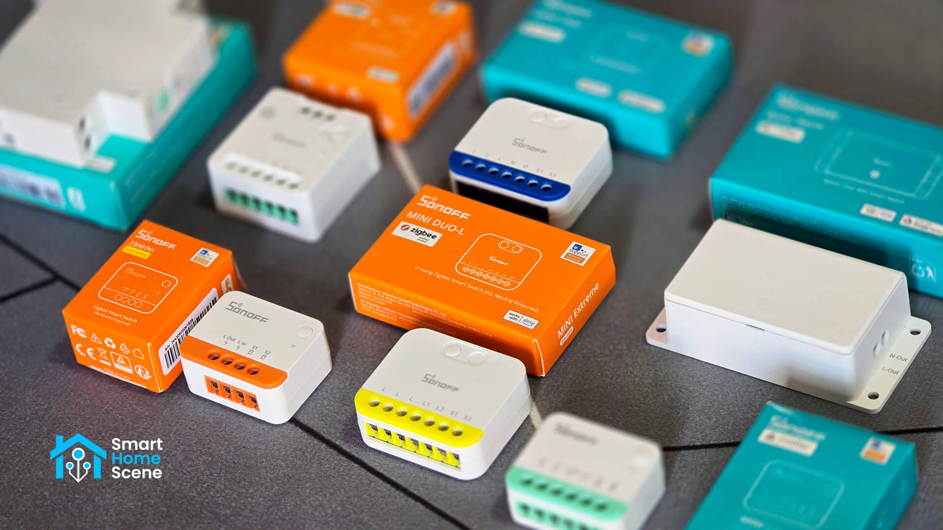 Sonoff Zigbee Smart Switch Modules Compared: Hero Image with all on office desk