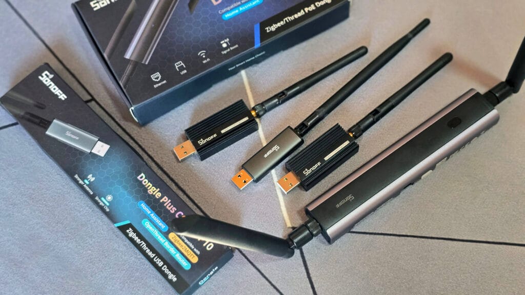 Sonoff Dongles On Table: Comparison by SmartHomeScene